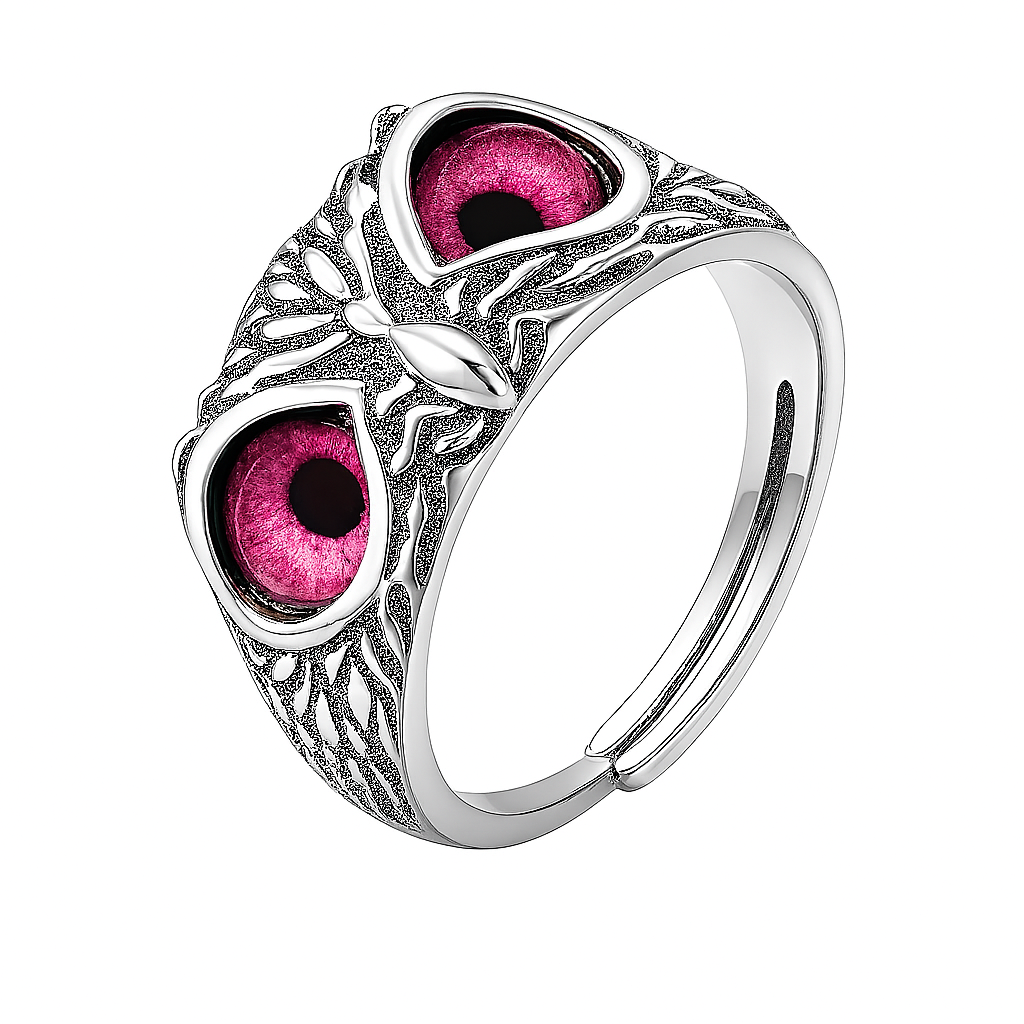 Silver ring with pink gemstones on a white background